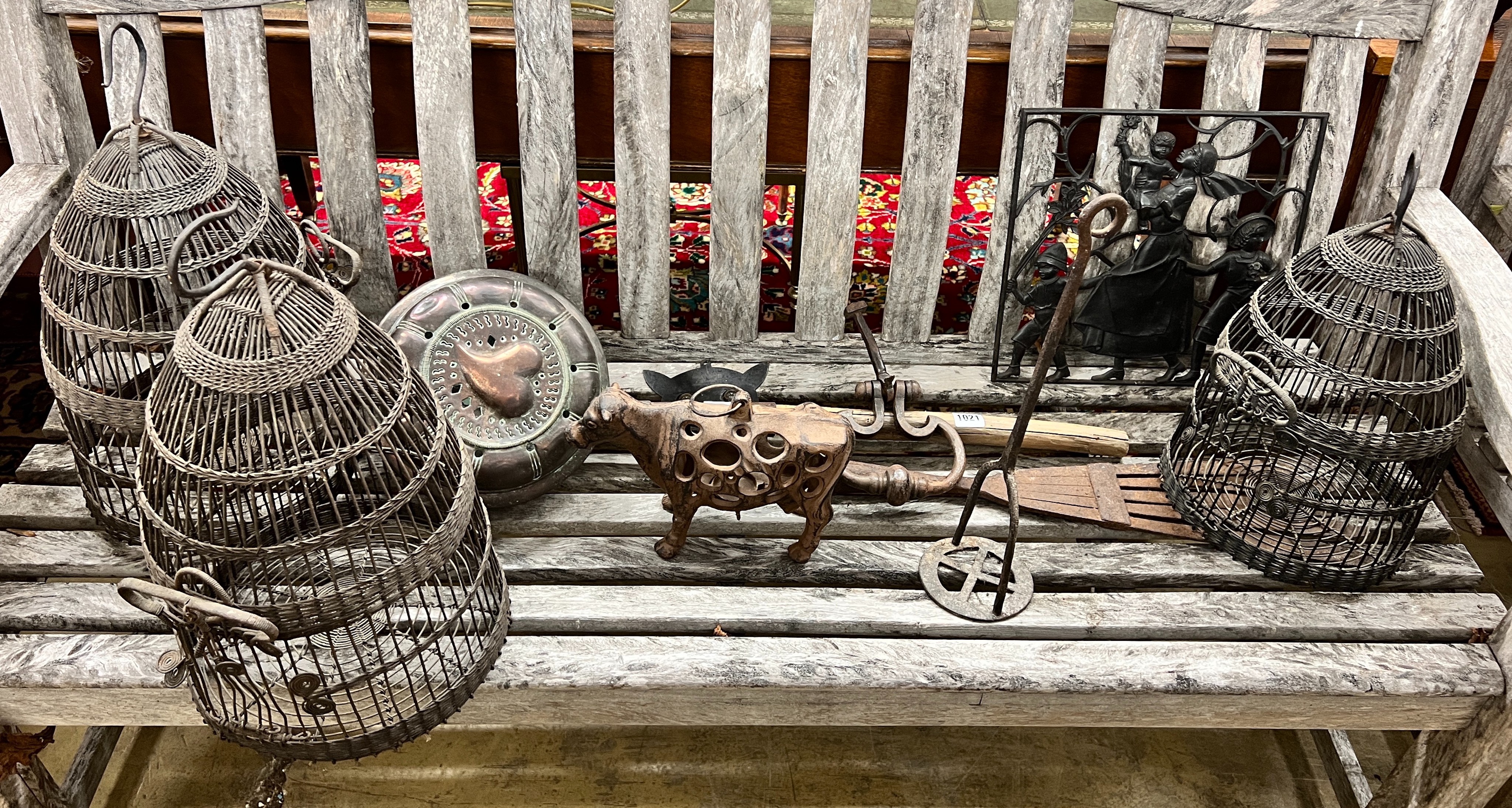 Three wrought iron bird cages and a collection of metalware